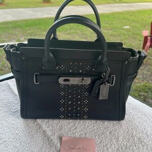 Coach swagger with rivets